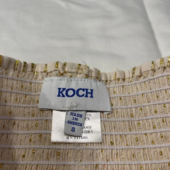 Koch “The Erica Skirt”. Size small in “Saxophone Stripe”. Removed tag included.